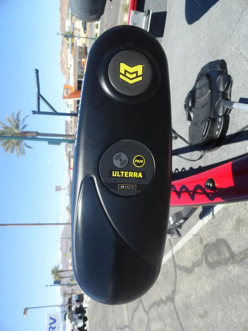 Slide: The Image of 2024 Tracker Pro Guide V-16 SC boat with Ulterra motor, outdoor setting. - 15