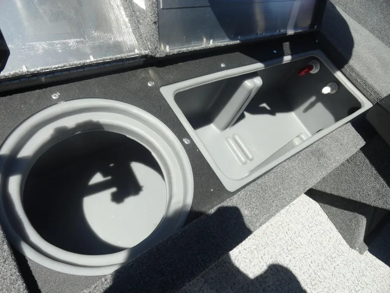 Slide: The Image of 2024 Tracker Pro Guide V-16 SC boat storage compartments, featuring durable design and functionality. - 16