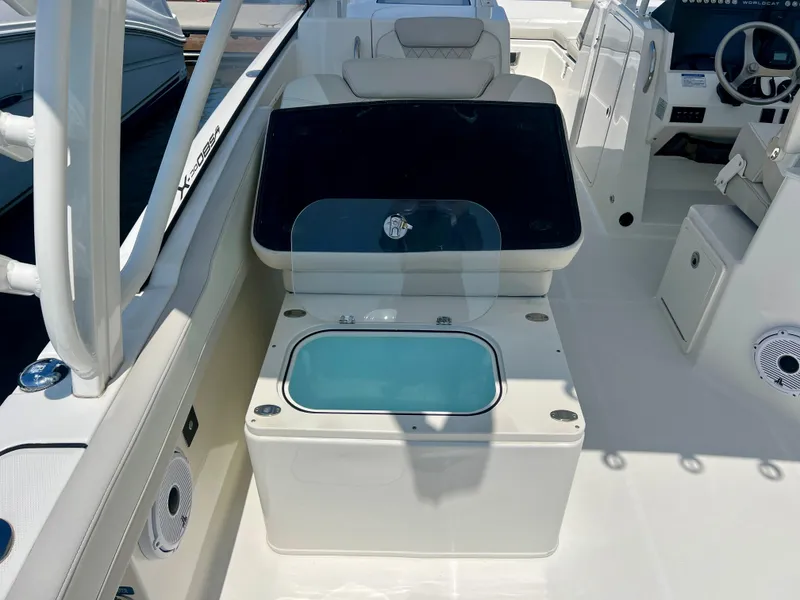 Slide: The Image of 2024 World Cat 280DC-x boat interior with seating and storage compartments. - 22