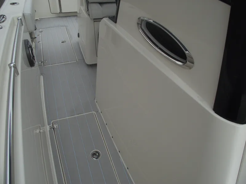 Slide: The Image of 2021 Cobia 301 Center Console boat interior with sleek design and modern fittings. - 25