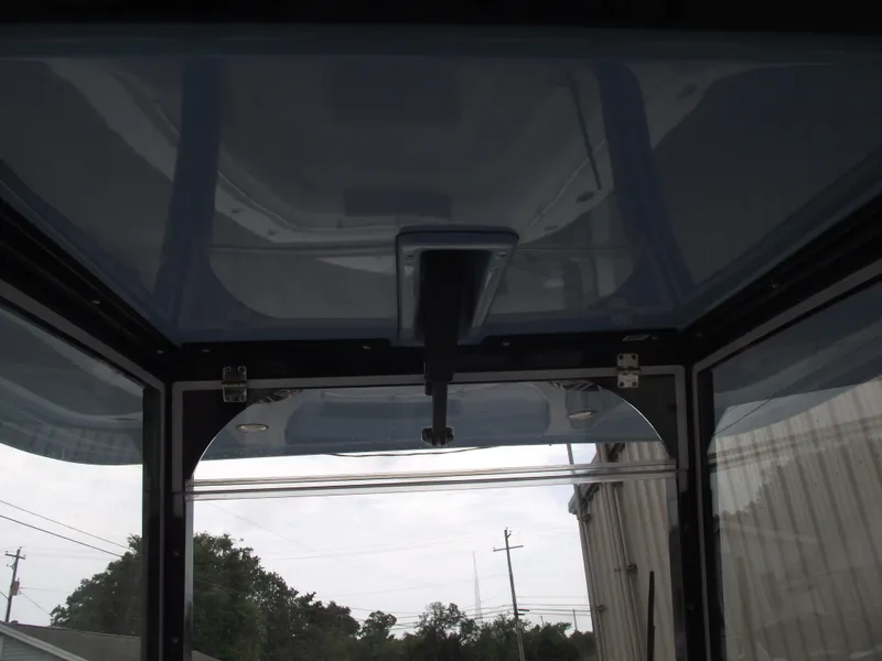 Slide: The Image of Interior view of a 2021 Cobia 301 Center Console boat's cabin ceiling. - 35