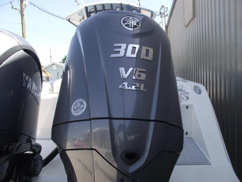 Slide: The Image of Yamaha 300 V6 4.2L outboard engine on 2021 Cobia 301 Center Console boat. - 4
