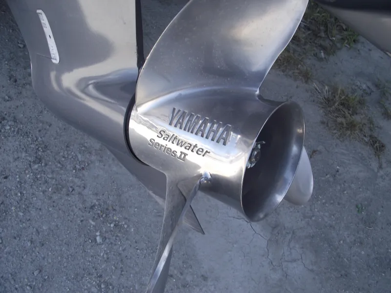 Slide: The Image of Yamaha Saltwater Series II propeller on 2021 Cobia 301 Center Console boat. - 6