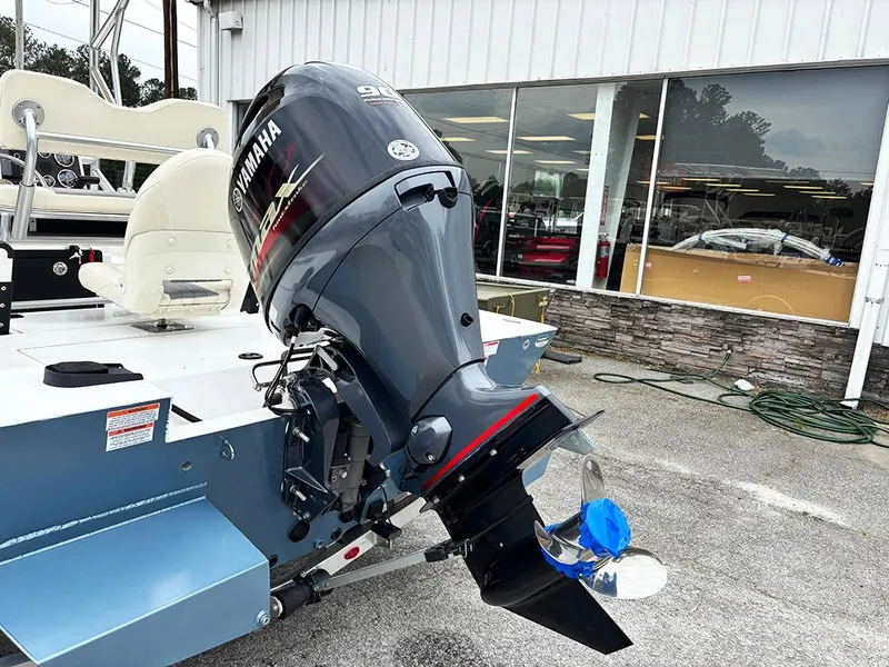 Slide: The Image of 2023 G3 Bay 18 GX boat with Yamaha outboard motor in a showroom. - 31
