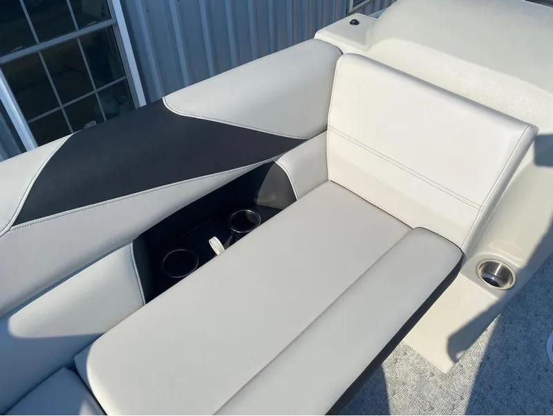 Slide: The Image of Luxurious seating on 2025 Trifecta 24 UL LE boat with cup holders and sleek design. - 21