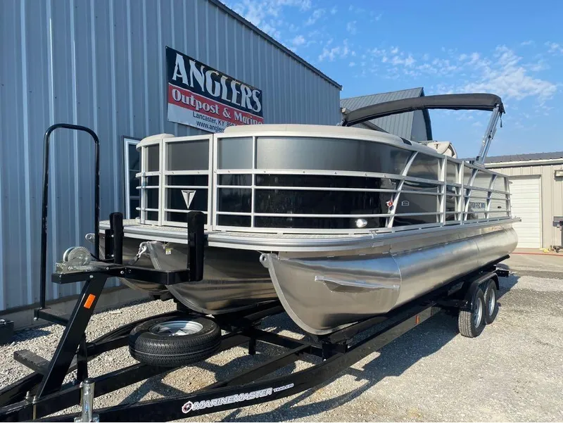 Slide: The Image of 2025 Trifecta 24 UL LE pontoon boat on trailer at Anglers Outpost & Marine. - 36