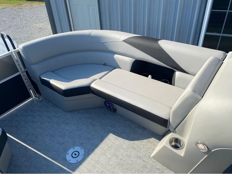 Slide: The Image of Luxurious seating on 2025 Trifecta 24 UL LE pontoon boat, featuring sleek design and comfort. - 38