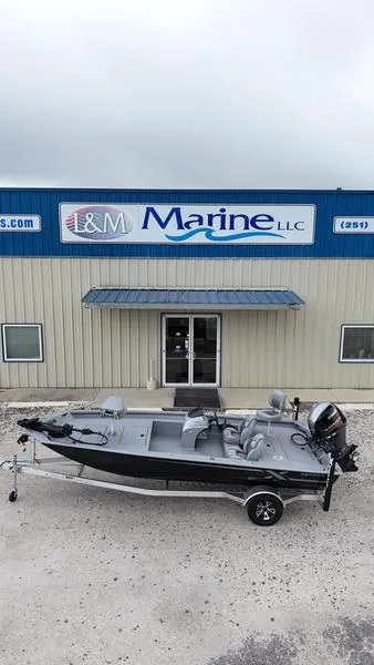 Slide: The Image of 2024 Xpress XP200 Catfish boat parked outside L&M Marine LLC building. - 3