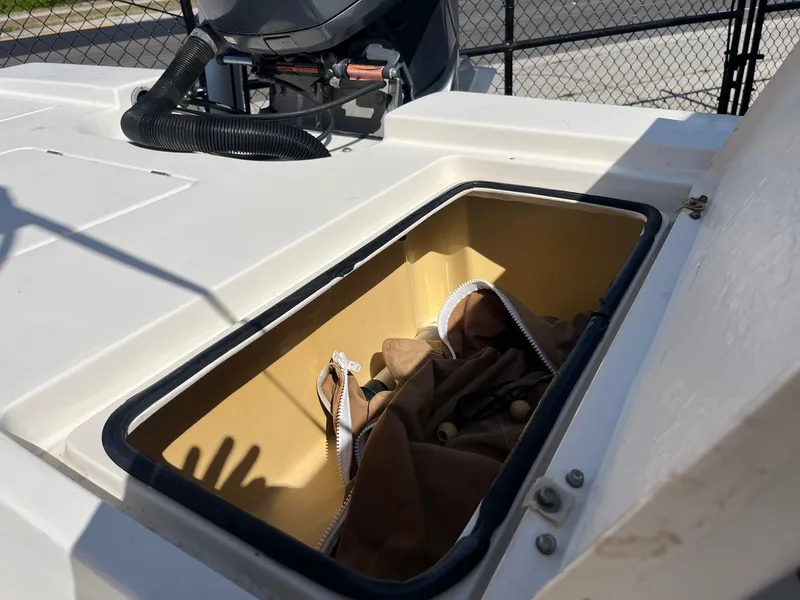 Slide: The Image of Open storage compartment on 2008 Pathfinder 2200 Tournament Edition boat. - 9