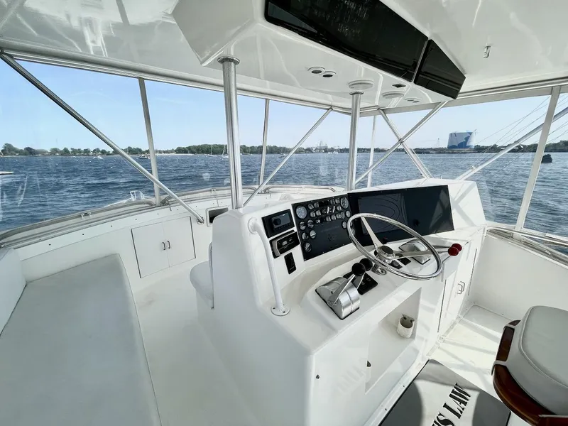 Slide: The Image of Helm of a 1997 Post 50 Convertible yacht with ocean view. - 32