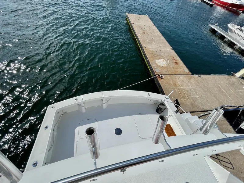 Slide: The Image of 1997 Post 50 Convertible yacht docked at marina, viewed from above. - 40