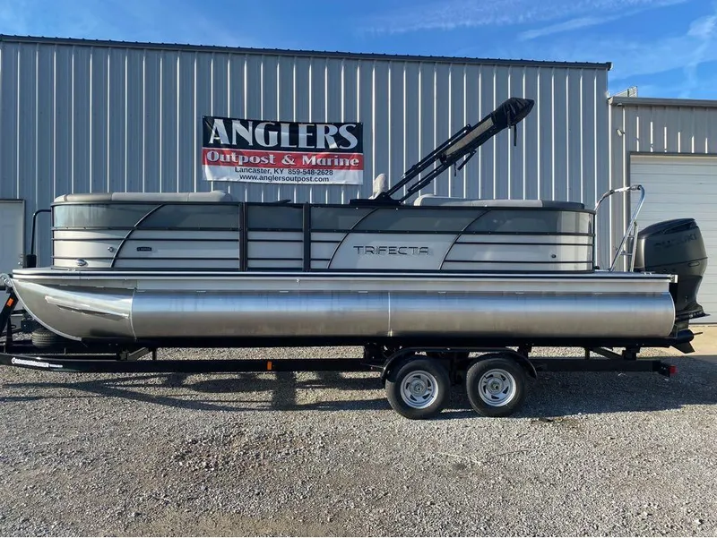 Slide: The Image of 2025 Trifecta C Series 24RFC pontoon boat on trailer at Anglers Outpost & Marine. - 11