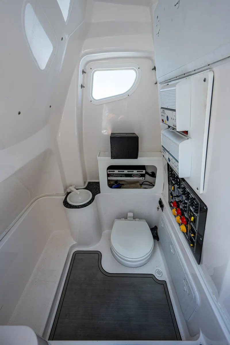 Slide: The Image of 2022 Sea Fox 288 Commander boat interior with toilet and control panel. - 17