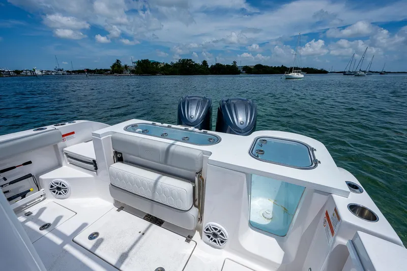 Slide: The Image of 2022 Sea Fox 288 Commander boat with dual engines on a calm sea. - 31