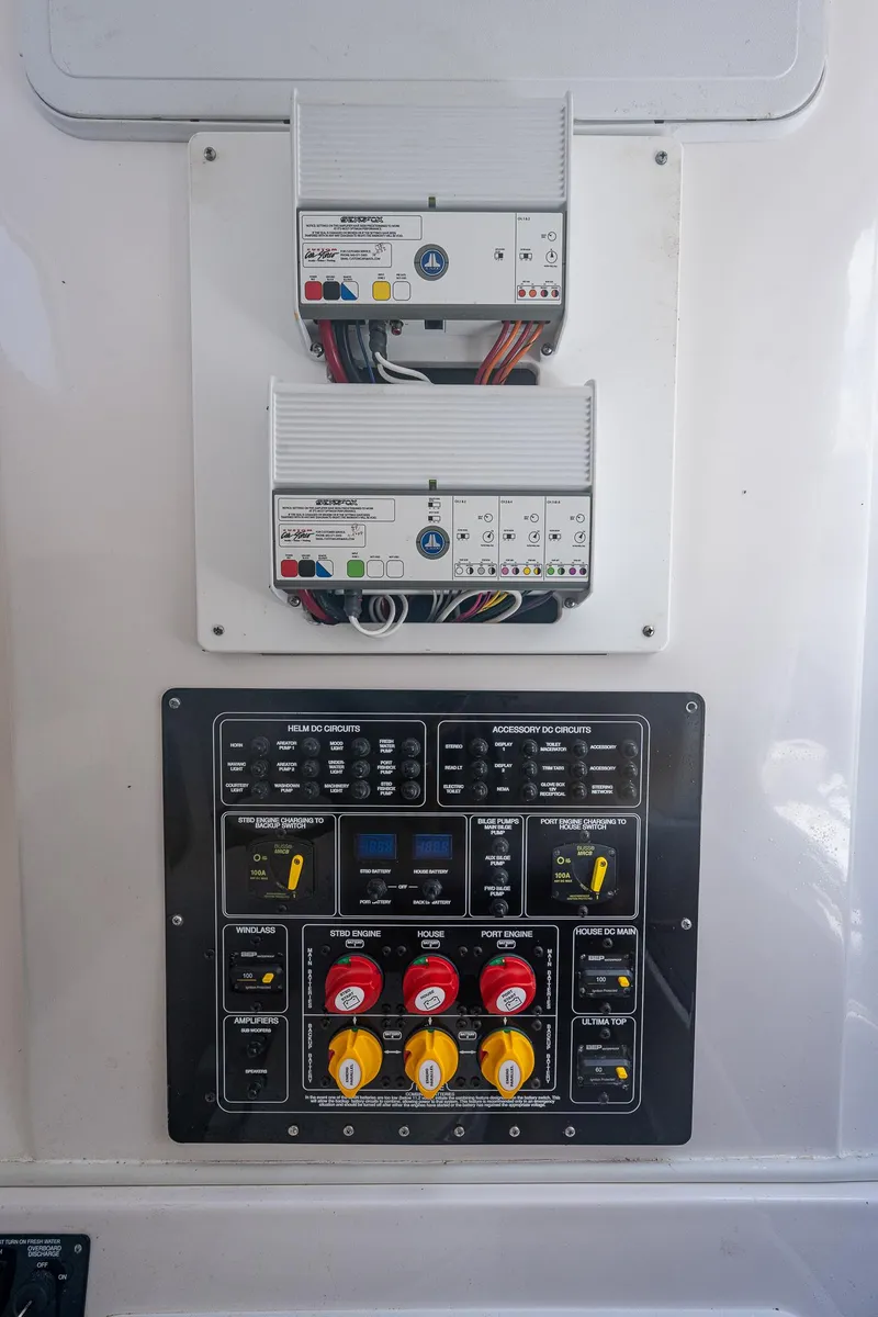 Slide: The Image of Control panel of 2022 Sea Fox 288 Commander boat with switches and wiring. - 32