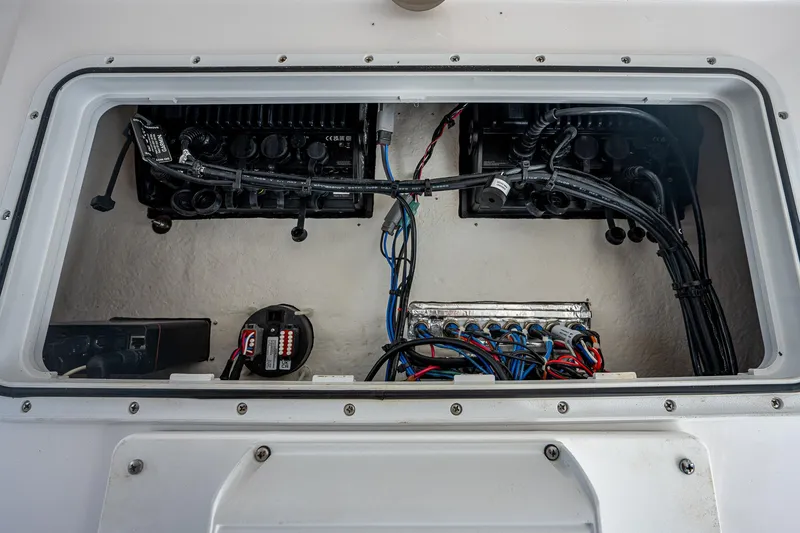 Slide: The Image of Electrical compartment of 2022 Sea Fox 288 Commander boat, showcasing wiring and components. - 33