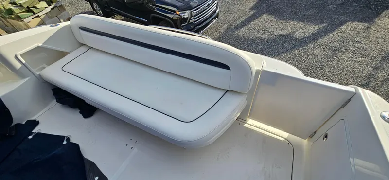 Slide: The Image of 2005 Sea Ray 360 Sundancer boat with white seating on deck. - 8