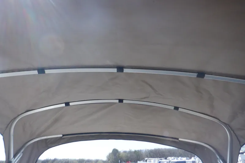 Slide: The Image of 2009 Premier 225 Sunsation LTD boat canopy, interior view. - 12