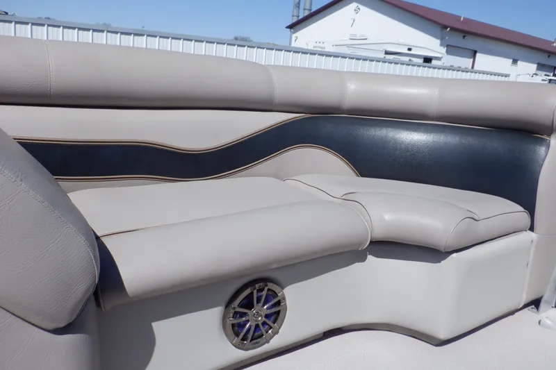 Slide: The Image of 2009 Premier 225 Sunsation LTD boat interior with beige and black seating. - 17