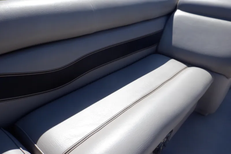 Slide: The Image of 2009 Premier 225 Sunsation LTD boat seating, gray upholstery with black accent. - 18