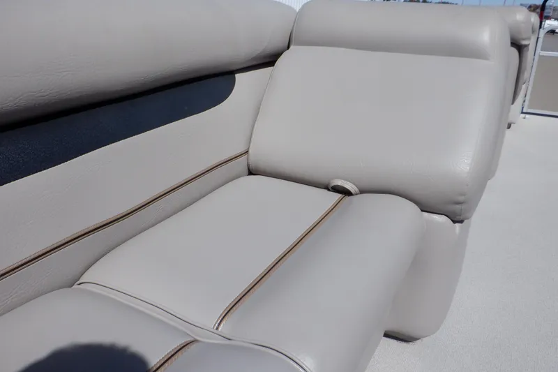 Slide: The Image of 2009 Premier 225 Sunsation LTD boat seating, beige upholstery, close-up view. - 26