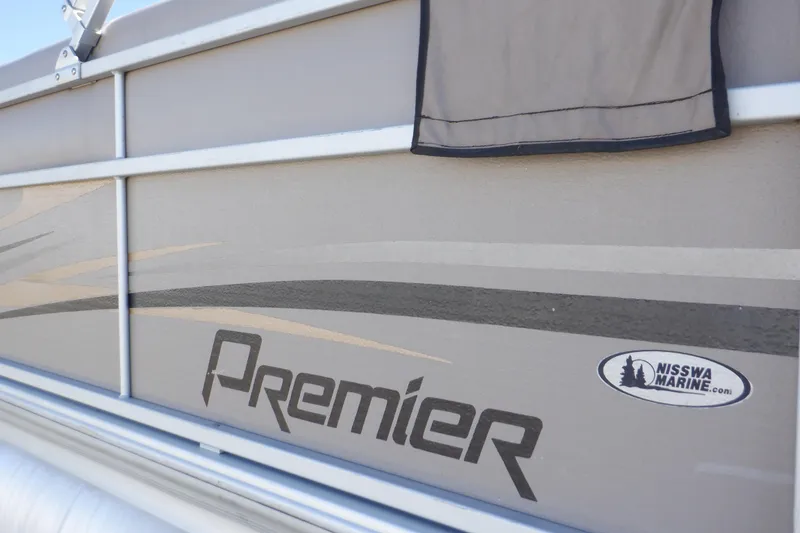 Slide: The Image of 2009 Premier 225 Sunsation LTD pontoon boat side view with Nisswa Marine logo. - 40