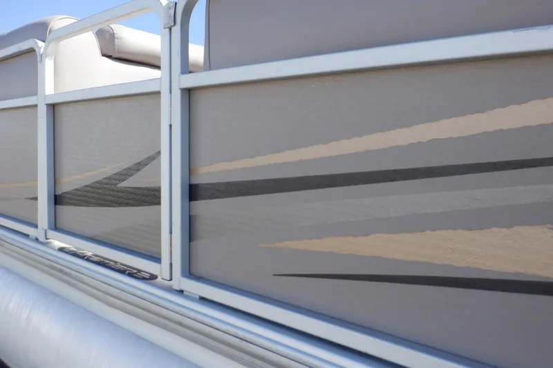 Slide: The Image of 2009 Premier 225 Sunsation LTD pontoon boat with sleek side panel design. - 41