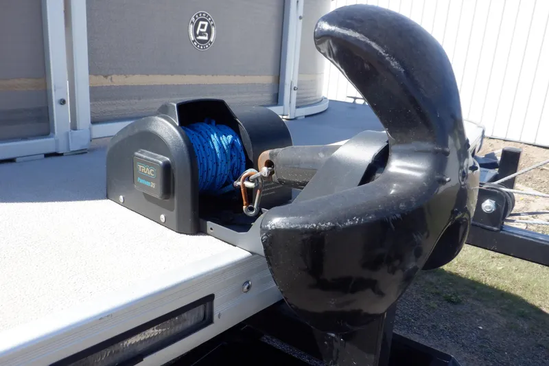 Slide: The Image of 2009 Premier 225 Sunsation LTD boat anchor system with blue rope on deck. - 45