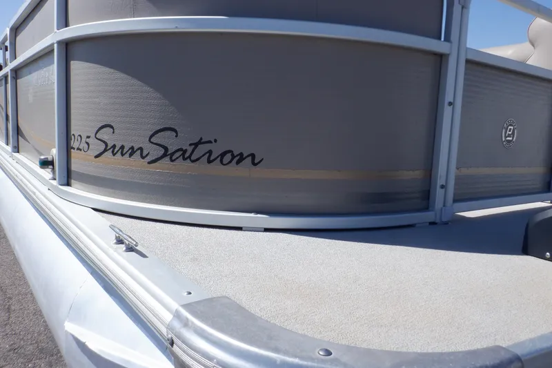 Slide: The Image of 2009 Premier 225 Sunsation LTD pontoon boat, close-up of side panel and deck. - 46