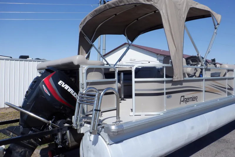 Slide: The Image of 2009 Premier 225 Sunsation LTD pontoon boat with Evinrude motor and canopy. - 5