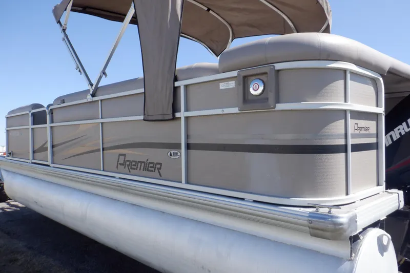 Slide: The Image of 2009 Premier 225 Sunsation LTD pontoon boat with canopy, side view. - 7