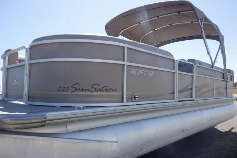 Slide: The Image of 2009 Premier 225 Sunsation LTD pontoon boat with canopy, side view. - 8