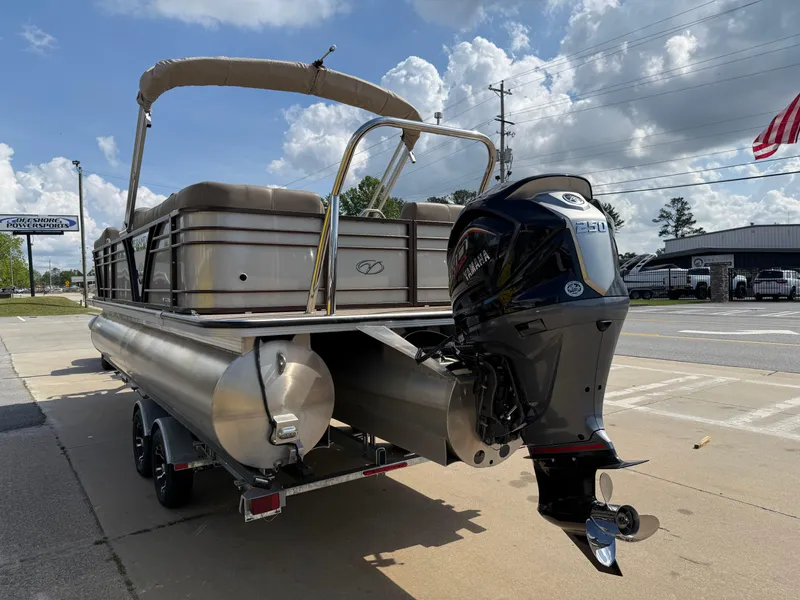 Slide: The Image of 2023 Veranda VTX 22RC pontoon boat with outboard motor on a trailer. - 19
