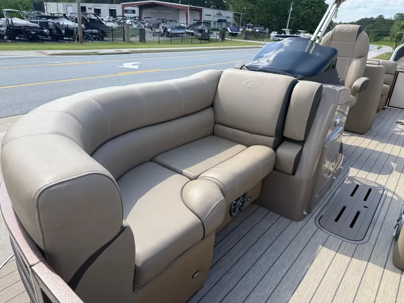 Slide: The Image of 2023 Veranda VTX 22RC pontoon boat with luxurious beige seating and sleek design. - 25