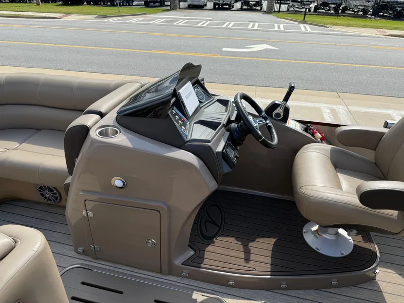 Slide: The Image of 2023 Veranda VTX 22RC boat interior with steering console and seating. - 34