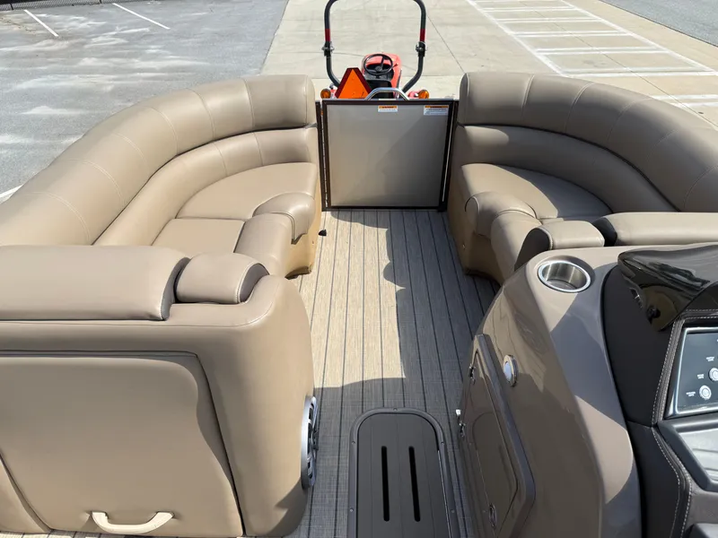 Slide: The Image of 2023 Veranda VTX 22RC pontoon boat interior with beige seating and modern controls. - 36