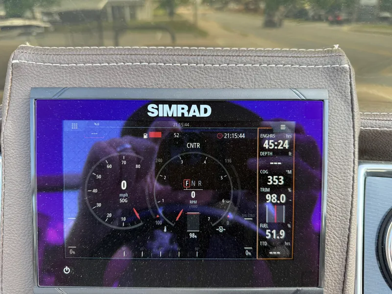 Slide: The Image of Simrad display on 2023 Veranda VTX 22RC showing engine and navigation data. - 40