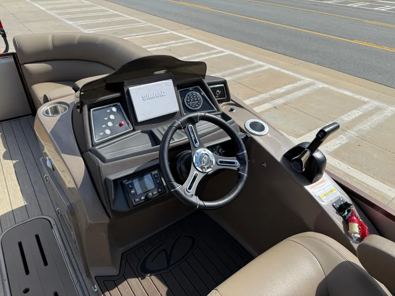 Slide: The Image of 2023 Veranda VTX 22RC boat dashboard with steering wheel and control panel. - 45