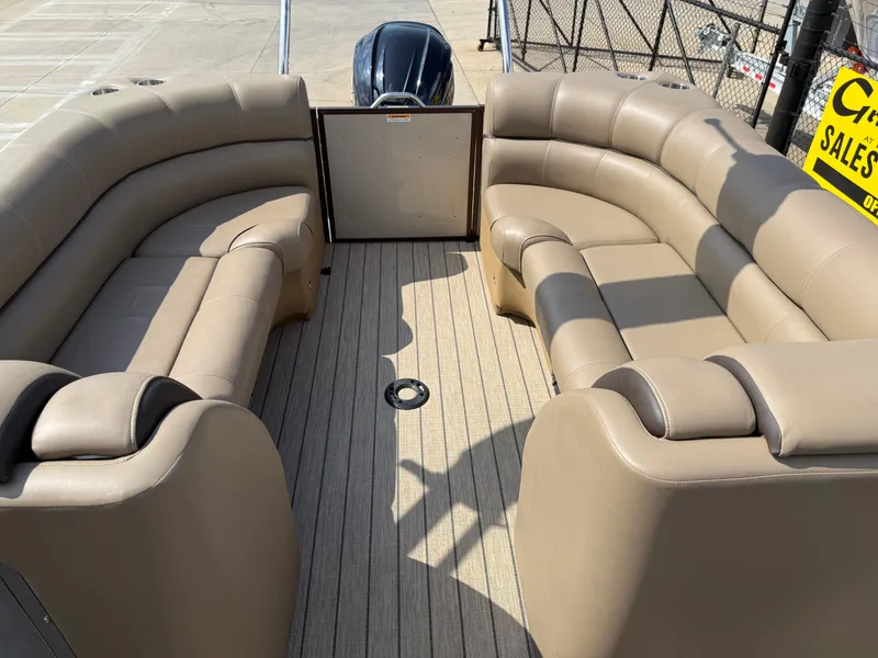 Slide: The Image of 2023 Veranda VTX 22RC pontoon boat with beige seating and spacious deck. - 47