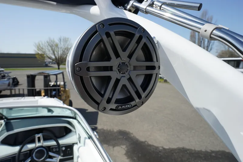 Slide: The Image of 2023 Four Winns HD3 Surf boat with JL Audio speaker system. - 13