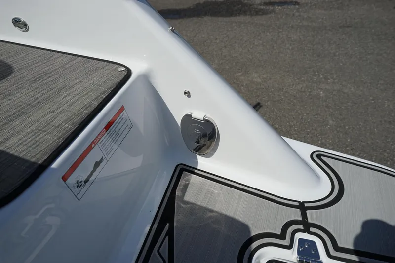 Slide: The Image of 2023 Four Winns HD3 Surf boat deck detail with sleek design and modern features. - 27