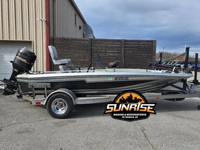 Slide: The Image of 1984 Champion CHAMP 2 boat on trailer at Sunrise Marine & Motorsports. - 1