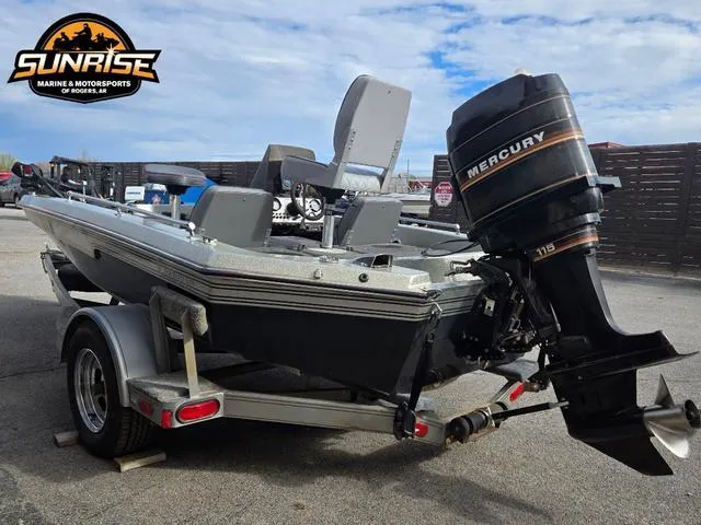Slide: The Image of 1984 Champion CHAMP 2 boat with Mercury engine on trailer at Sunrise Marine & Motorsports. - 14