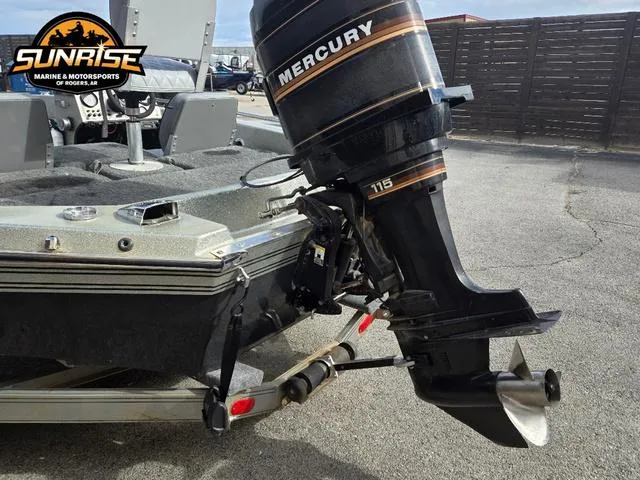 Slide: The Image of 1984 Champion CHAMP 2 boat with Mercury 115 outboard motor at Sunrise Marine. - 15