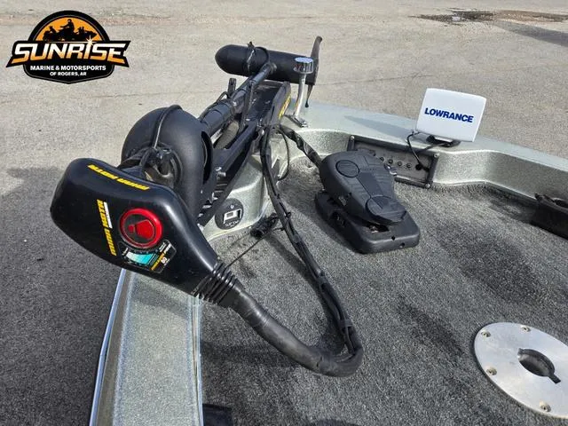 Slide: The Image of 1984 Champion CHAMP 2 boat deck with trolling motor and Lowrance fish finder. - 4