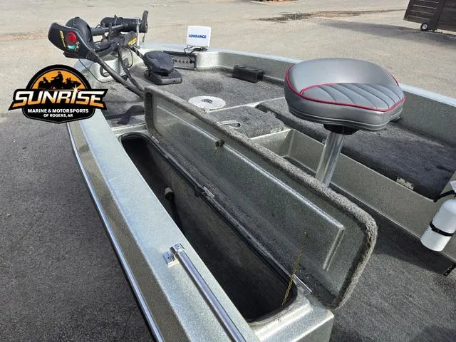 Slide: The Image of 1984 Champion CHAMP 2 boat interior with storage compartment and seat, Sunrise Marine logo visible. - 5