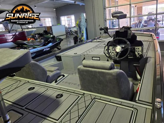 Slide: The Image of 2025 Avid 20 Vertex boat interior at Sunrise Marine showroom, featuring modern seating and controls. - 21