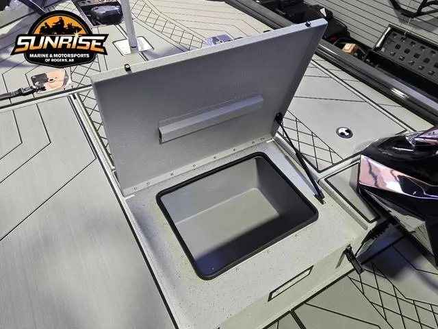 Slide: The Image of 2025 Avid 20 Vertex boat storage compartment with Sunrise Marine logo. - 7