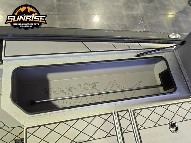 Slide: The Image of 2025 Avid 20 Vertex boat storage compartment with Sunrise Marine logo. - 9