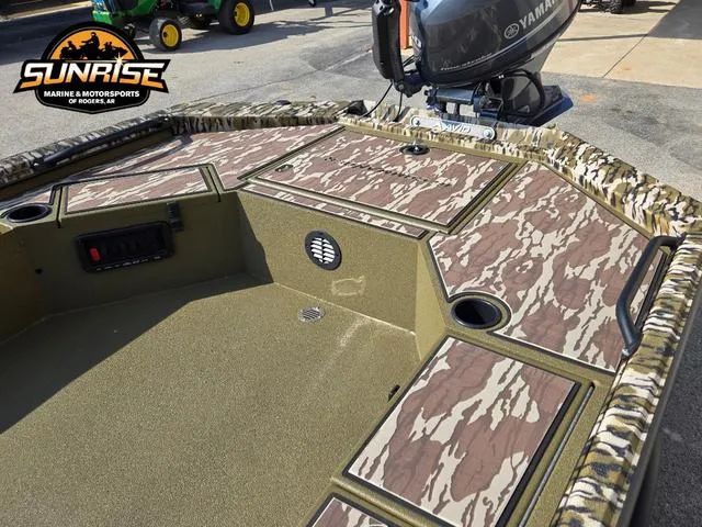 Slide: The Image of Avid 16 Commander 2025 boat with camouflage deck and Yamaha motor at Sunrise Marine. - 11